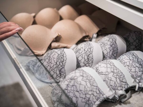 feminine-lacy-underwear-stored-in-cases-in-a-wardr-H3M9UYP